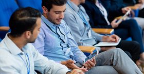 Business executives participating in a business meeting at conference center