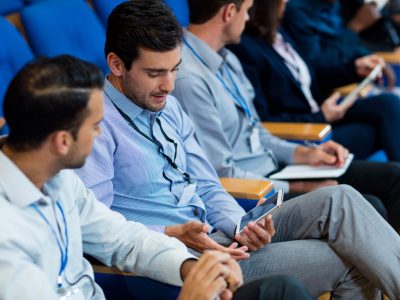 Business executives participating in a business meeting at conference center