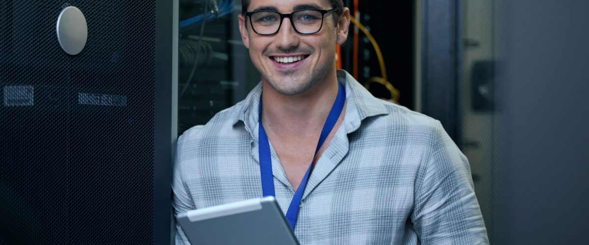Engineer, server room and portrait of a man with a tablet for programming, cybersecurity or maintenance. Technician person in a datacenter for network, software or system upgrade app with technology.