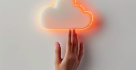 hand-is-reaching-cloud-that-has-red-neon-light-it