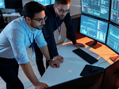 it-professionals-analyzing-real-time-data-control-room