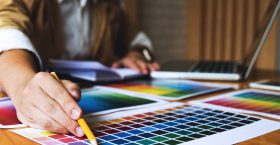 Graphic designers choose colors from the color bands samples for Graphic designers choose colors from the color bands samples for design .Designer graphic creativity work concept .