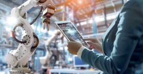 person-holding-tablet-smart-manufacturing