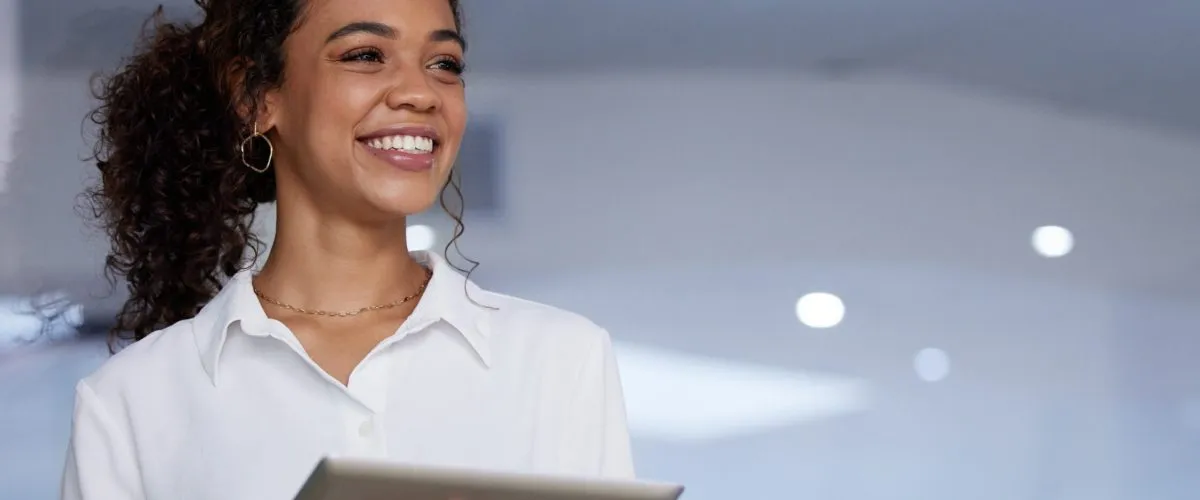 Smile, woman in office with tablet and mockup, thinking and planning online schedule, business and search. Happy businesswoman in workplace, digital app and mock up space with startup website info
