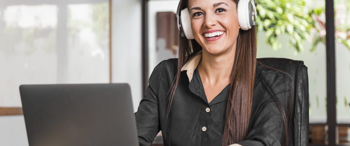 woman-wearing-headphones-looking-camera