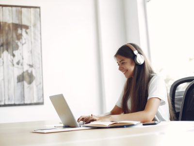 Students create a new project. Girl learning and use the laptop