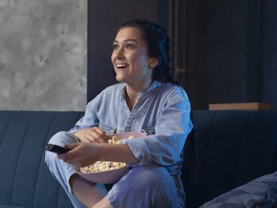 young-woman-watching-streaming-service-home
